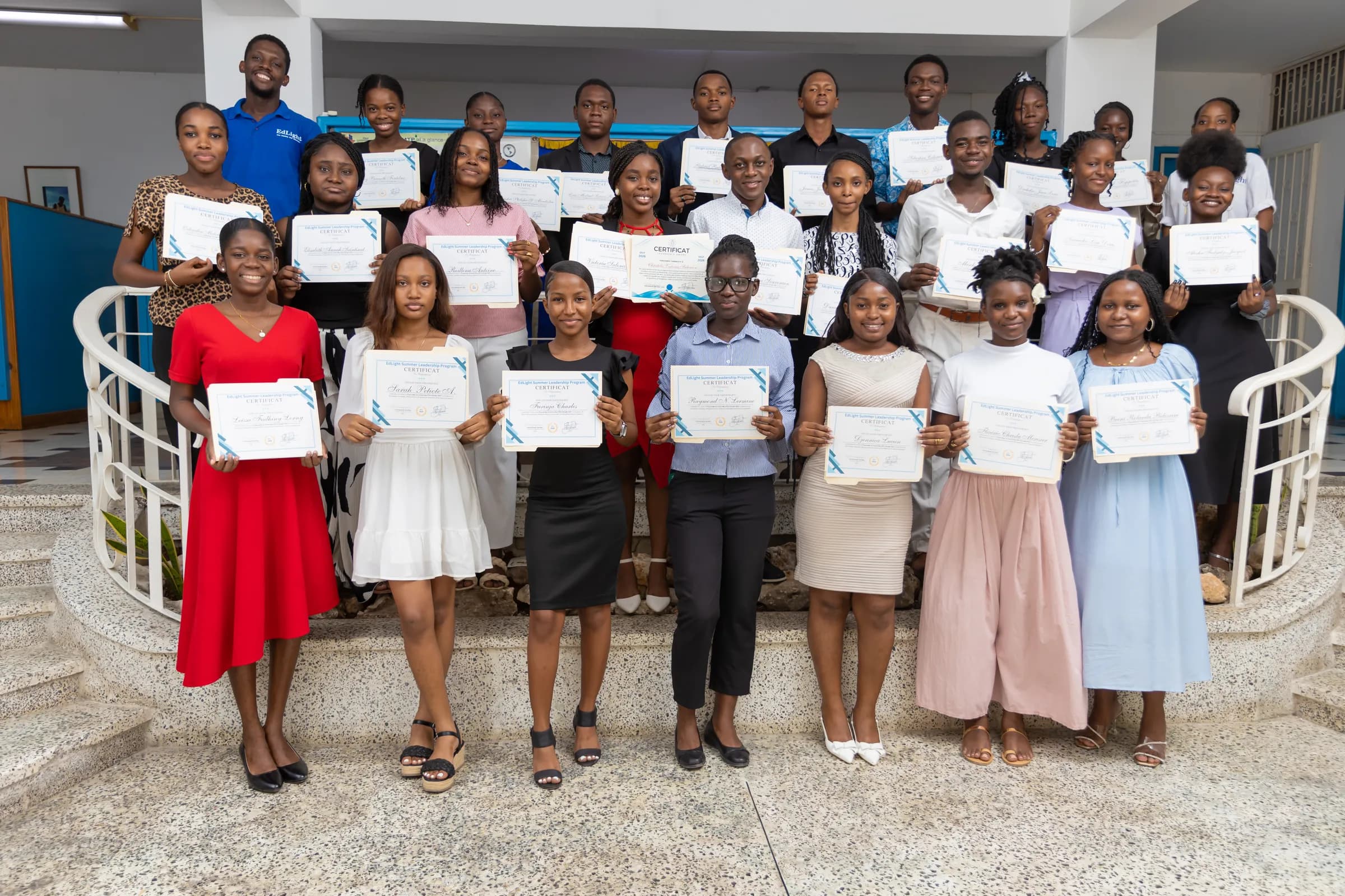 ESLP 2026 fellows holding their certificates at IICA in Pétion-Ville